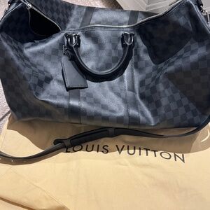 Men’s Louis Vittion weekend bag